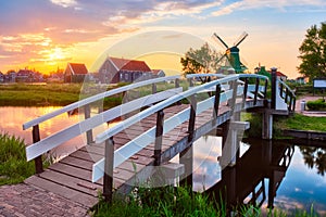 Windmills at Zaanse Schans in Holland on sunset. Zaandam, Nether