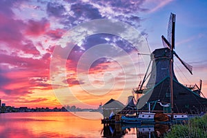 Windmills at Zaanse Schans in Holland on sunset. Zaandam, Nether