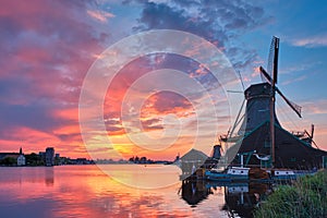 Windmills at Zaanse Schans in Holland on sunset. Zaandam, Nether