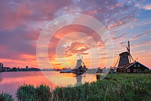 Windmills at Zaanse Schans in Holland on sunset. Zaandam, Nether