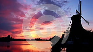 Windmills at Zaanse Schans in Holland on sunset. Zaandam, Nether