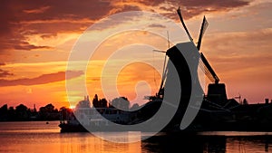 Windmills at Zaanse Schans in Holland on sunset. Zaandam, Nether