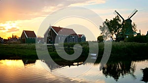 Windmills at Zaanse Schans in Holland on sunset. Zaandam, Nether