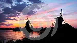 Windmills at Zaanse Schans in Holland on sunset. Zaandam, Nether