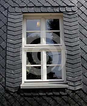 Window in a slate wall, Thuringia, Germany photo