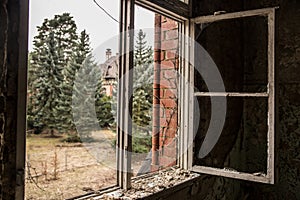 Window at abandoned hospital and sanatorium Beelitz HeilstÃ¤tten near Berlin