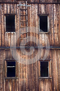 window in abandoned house broken