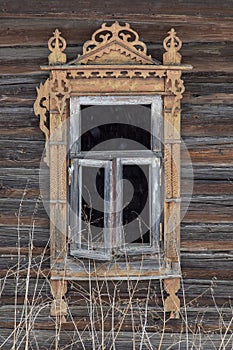 Window of an abandoned old wooden house