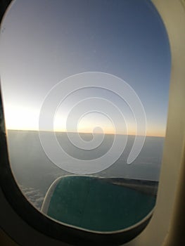 A window of aeroplane abd yhe nice morning
