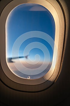 The window of the airplane. A view of porthole window on board an airbus for your travel concept