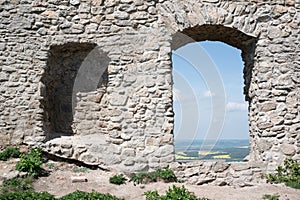 Window, alcove and hole in wall of antique building made of stone