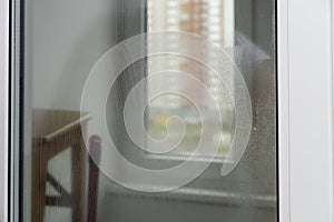 Window of the apartment with detergents