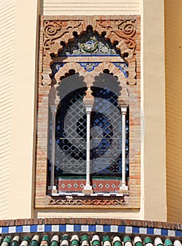 Window in the arabesque style Mudejar Pavilion, Seville, Andalusia, Spain.