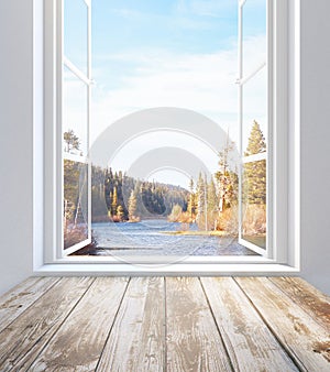 Window with autumn landscape view