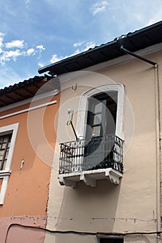 Window with a balcony on a colonial building