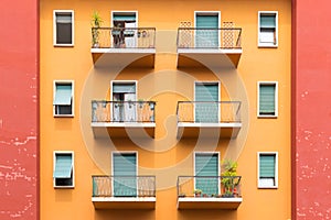 Window and balcony of typical old European residential building in Verona, Italy