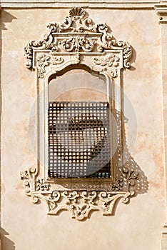 Window with baroque decorations - Noto town Sicily Italy