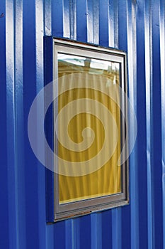 Window in Blue Container Building