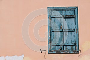 Window with blue shutter