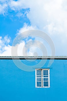 Window in blue wall