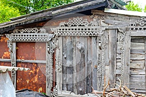 Window carved wooden platbands with elephants and sea horses