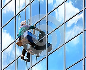 Window cleaner at work