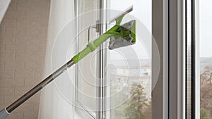 window cleaning of special mop for washing the glass surface of windows.