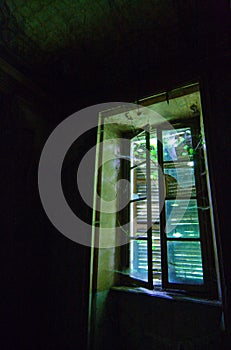 A window with closed shutters photo