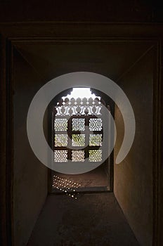 A window decorated with carvings. Bir Singh Palace or Bir Singh Dev Palace. Dati. Madhya Pradesh photo