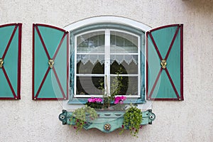 window with decoration - picturesque house Ramsau, Austria