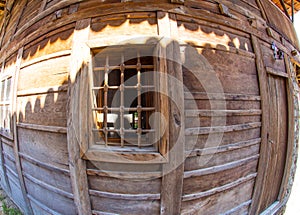 Window - an element of the stone-wooden architecture of the mountain village of Zheravna in Bulgaria