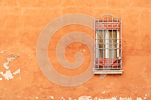 Window on the Facade of Italian stone wall