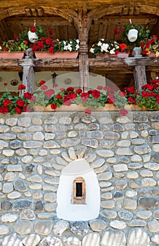 Window on the faÃÂ§ade of a stone wall