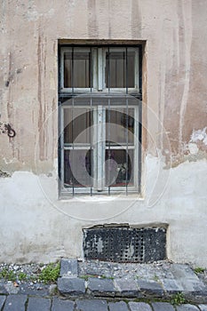 Window on the faÃÂ§ade of a stone wall
