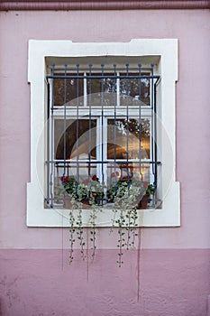 Window on the faÃÂ§ade of a stone wall