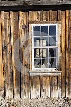 Window frame in a wood building weathered by time