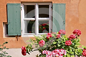 Window in a Fuggerei building, Augsburg, Bayern, Germany