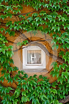 Window in a Fuggerei building, Augsburg, Bayern, Germany