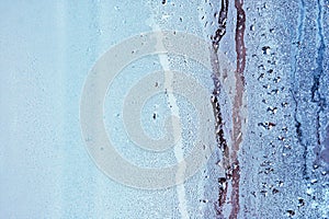 Window glass in the condensate in the cold currents of the water drops background