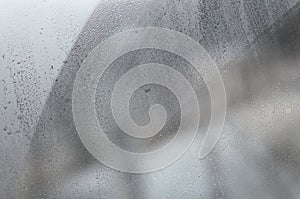Window glass with condensate or steam after heavy rain, Texture or background image