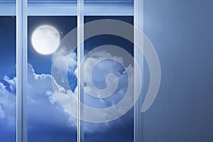 Window glass in the empty room with moonlight