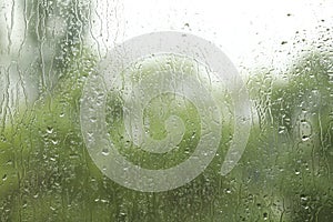 Window glass with raindrops as background, closeup