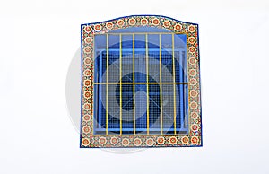 Window with glazed tiles border, Tangier, Morocco