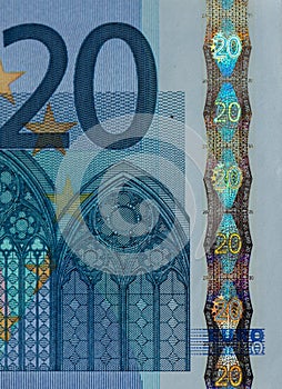 Window in Gothic architecture and security features on 20 euro banknote obverse