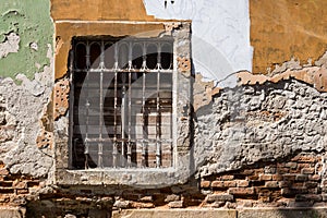 Window with grating of an abandoned house