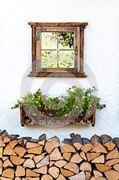 Window with house wall and flower box