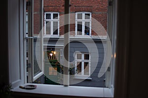 WINDOW FROM INTERIOR OF THE HOUSE, COPENHAGUE, DENMARK, MARCH 2019 photo