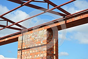 Window lintel construction. Steel roof trusses details with bricklaying frame windows construction. Steel Lintels. photo