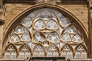 Window of medieval Gothic church converted later into mosque