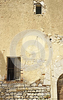 Window in medieval tower in an architectural ensemble of El Garraf, Barcelona